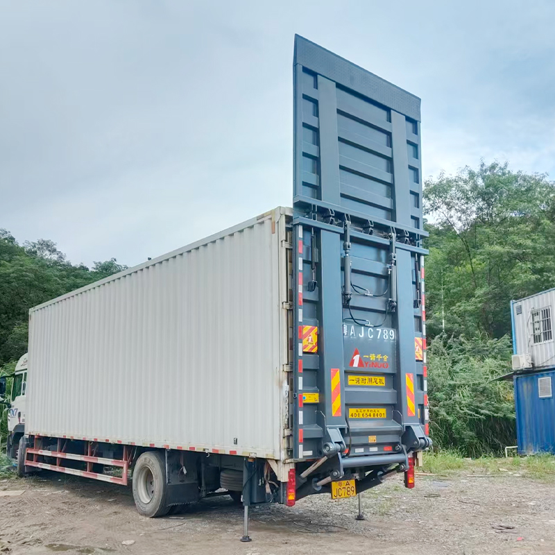 How to design a buffer device to reduce the closing impact force in a heavy-duty lifting tailgate?